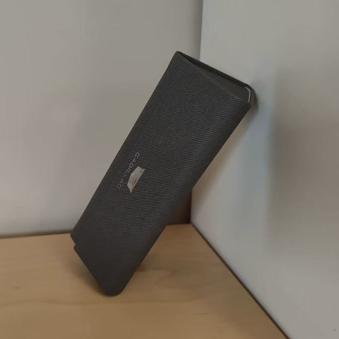 This is a glass case in another perspective,It's the closest thing to a triangle in my house. I chose it because I don't have anything triangular at home.